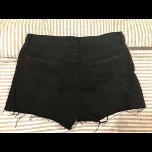 Free people black denim distressed shorts
